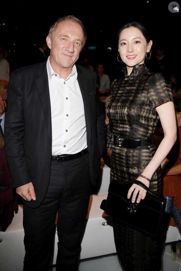 Francois-Henri Pinault, PDG de Kering et Lee Young au défilé Gucci à Milan le 18 septembre 2013