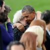 Barack Obama et Michelle Obama ont assisté à une cérémonie hommage aux victimes de la tuerie de Navy Yard, le 22 septmbre 2013 à Washington. Le couple a réconforté les familles et le président a délivré un discours.