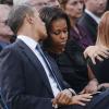 Le président Barack Obama et Michelle Obama ont assisté à une cérémonie hommage aux victimes de la tuerie de Navy Yard, le 22 septmbre 2013 à Washington. Le couple a réconforté les familles et le président a délivré un discours.