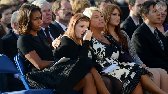 Barack Obama et Michelle Obama ont assisté à une cérémonie hommage aux victimes de la tuerie de Navy Yard, le 22 septmbre 2013 à Washington. Le couple a réconforté les familles et le président a délivré un discours.