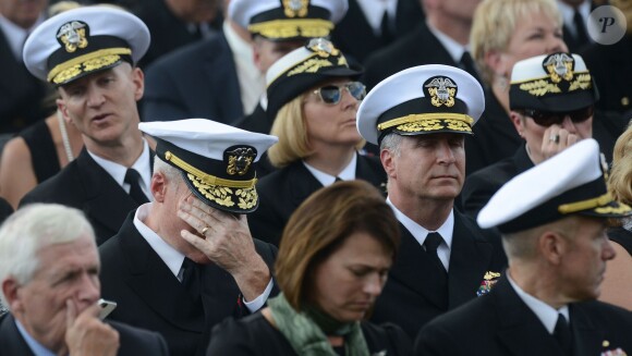 Barack Obama et Michelle Obama ont assisté à une cérémonie hommage aux victimes de la tuerie de Navy Yard, le 22 septmbre 2013 à Washington. Le couple a réconforté les familles et le président a délivré un discours.