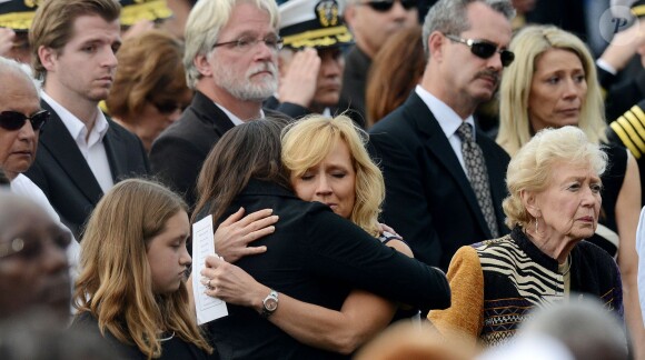 Barack Obama et Michelle Obama ont assisté à une cérémonie hommage aux victimes de la tuerie de Navy Yard, le 22 septmbre 2013 à Washington. Le couple a réconforté les familles et le président a délivré un discours.