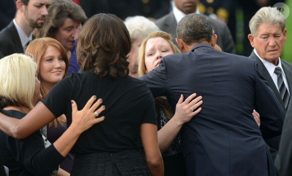 Barack Obama et Michelle Obama ont assisté à une cérémonie hommage aux victimes de la tuerie de Navy Yard, le 22 septmbre 2013 à Washington. Le couple a réconforté les familles et le président a délivré un discours.