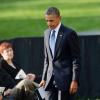 Barack Obama et Michelle Obama ont assisté à une cérémonie hommage aux victimes de la tuerie de Navy Yard, le 22 septmbre 2013 à Washington. Le couple a réconforté les familles et le président démocrate a délivré un discours.