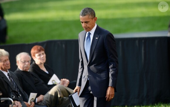 Barack Obama et Michelle Obama ont assisté à une cérémonie hommage aux victimes de la tuerie de Navy Yard, le 22 septmbre 2013 à Washington. Le couple a réconforté les familles et le président démocrate a délivré un discours.