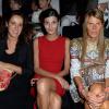 Coco Brandolini d'Adda, Giovanna Battaglia et Anna Dello Russo assistent au défilé Dolce & Gabbana printemps-été 2014 à Milan. Le 22 septembre 2013.