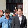 Lionel Messi arrive au tribunal de Gava avec son frère Rodrigo, près de Barcelone, le 27 septembre 2013, où il doit être entendu dans le cadre de sa mise en examen pour fraude fiscale.