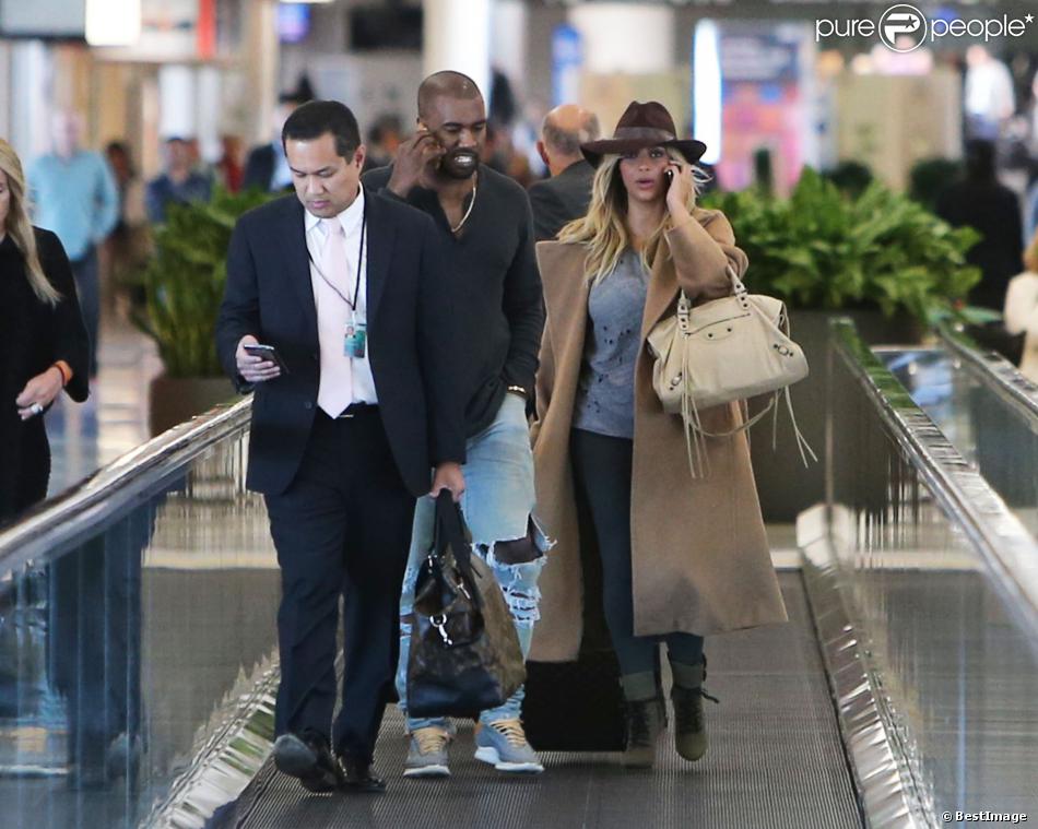  Exclusif 
 Kim Kardashian et Kanye West ont esquivé l&#039;aéroport de Los Angeles et ont été photographié l&#039;aéroport de San Francisco pour prendre un avion pour Paris, le 27 septembre 2013. Sans leur bébé North. 