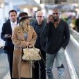  Exclusif 
 Kim Kardashian et Kanye West a l'aéroport de San Francisco pour prendre un avion pour Paris, le 27 septembre 2013. Sans leur bébé North. 