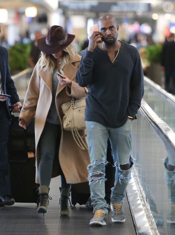 Exclusif
Kim Kardashian et Kanye West a l'aéroport de San Francisco pour prendre un avion pour Paris, le 27 septembre 2013. Sans leur bébé North.