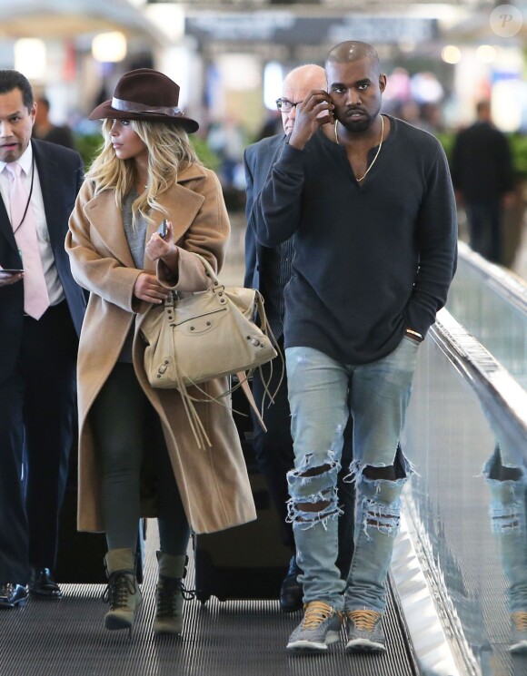 Exclusif
Kim Kardashian et Kanye West a l'aéroport de San Francisco pour prendre un avion pour Paris, le 27 septembre 2013. Sans leur bébé North.