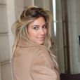 Kim Kardashian, radieuse à Paris, devant les locaux de Givenchy. Le 28 septembre 2013