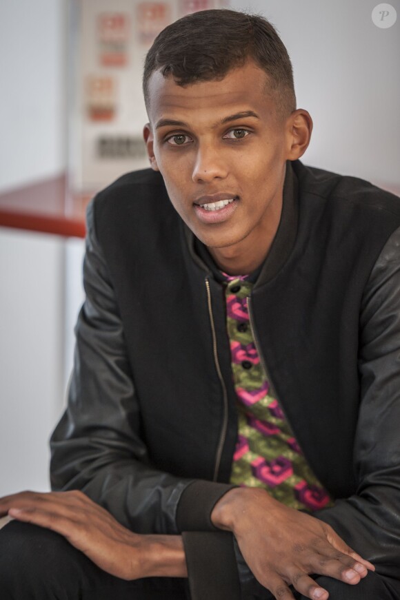 Stromae lors d'une séance photo à Bruxelles en Belgique, le 19 août 2013.