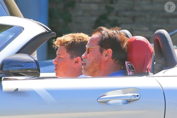 Arnold Schwarzenegger et son fils Christopher à Los Angeles, le 29 septembre 2013.