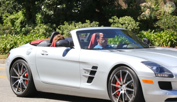 Arnold Schwarzenegger et son fils Christopher en voiture dans les rues de Los Angeles, le 29 septembre 2013.