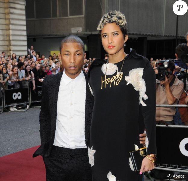 Pharrell Williams et Helen Lasichanh lors des GQ Men of the Year Awards à Londres, le 3 septembre 2013.