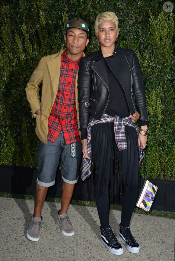 Pharrell Williams et Helen Lasichanh à Los Angeles, le 31 août 2013.