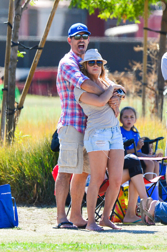 LeAnn Rimes et Eddie Cibrian jouent aux supporters. Mason, le fils de l'acteur, est en plein match, à Los Angeles, le samedi 5 octobre 2013.