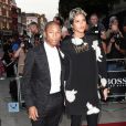 Pharrell Williams et sa chérie Helen Lasichanh lors des GQ Men of the Year Awards à Londres, le 3 septembre 2013.