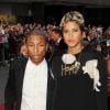 Pharrell Williams et Helen Lasichanh lors des GQ Men of the Year Awards à Londres, le 3 septembre 2013.
