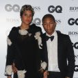 Pharrell Williams et Helen Lasichanh lors des GQ Men of the Year Awards à Londres, le 3 septembre 2013.