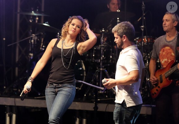 Lorie et Grégoire à Lyon, le 12 octobre 2013, lors de la 7ème édition de "Foot-Concert" au Palais des sports.