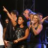 Amel Bent et Lorie à Lyon, le 12 octobre 2013, lors de la 7ème édition de "Foot-Concert" au Palais des sports.