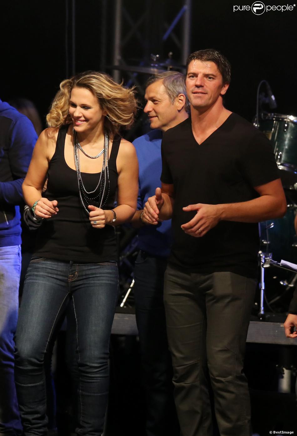 Lorie et Gregory Coupet à Lyon, le 12 octobre 2013, lors de la 7ème édition de &quot;Foot-Concert&quot; au Palais des sports.