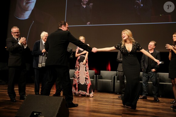 Quentin Tarantino et Mélanie Laurent - Remise du Prix Lumière à Quentin Tarantino lors du Festival Lumière à Lyon le 18 octobre 2013.