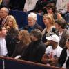 Manuel Valls, avec Jean Gachassin à sa droite, et Anne Gravoin, assise à côté d'Henri Leconte, devant Michèle Laroque et François Baroin au BNP Paribas Masters de Paris-Bercy le 1er novembre 2013, pour les quarts de finale du tournoi.