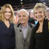 Marie-Josée Croze, Charles Aznavour et Véronique Jannot lors de l'enregistrement de l'émission Vivement dimanche à Paris le 6 novembre 2013. Diffusion sur France 2 le 10 novembre