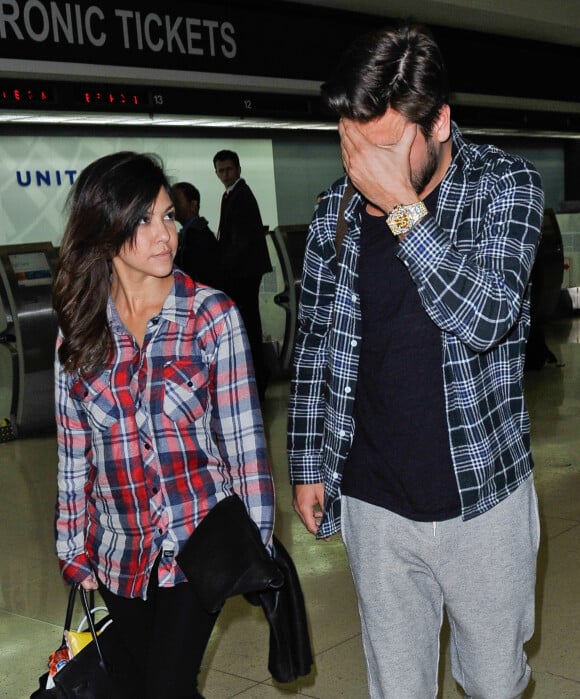 Kourtney Kardashian et Scott Disick à l'aéroport de Los Angeles, le 6 novembre 2013.