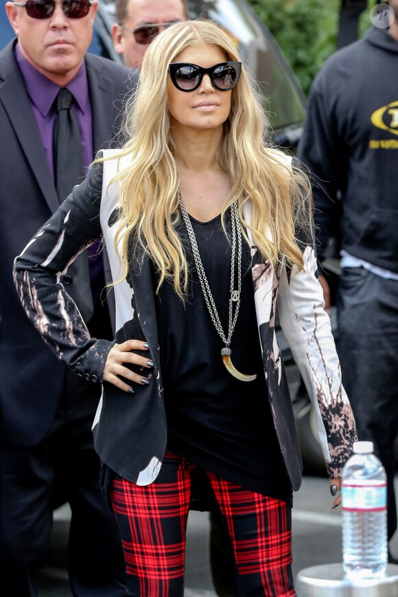Fergie sur le plateau de l'émission "Extra" à Los Angeles, le 20 novembre 2013.