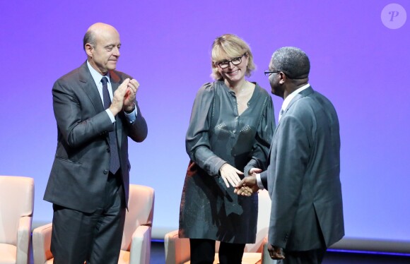 Alain Juppe, Claude Chirac et Denis Mukwege au Musée du Quai Branly à Paris, le 21 Novembre 2013