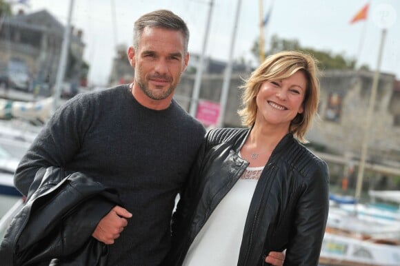 Vanessa Valence et Philippe Bas posent pour le photocall de la série 'Profilag ' durant le 15e Festival de la Fiction TV de La Rochelle le 13 septembre 2013.