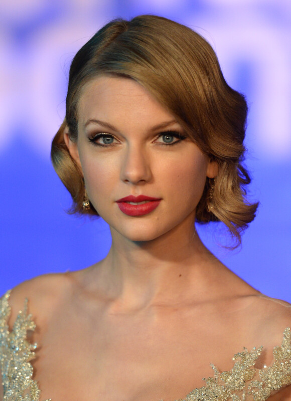 American singer Taylor Swift attends the Centrepoint Winter Whites Gala at Kensington Palace in London, UK, on November 26, 2013. Photo by XPosure/ABACAPRESS.COM27/11/2013 - London