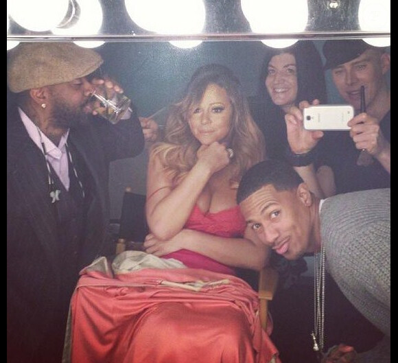 Mariah Carey et son équipe (dont son mari Nick Cannon), le 2 novembre 2013.