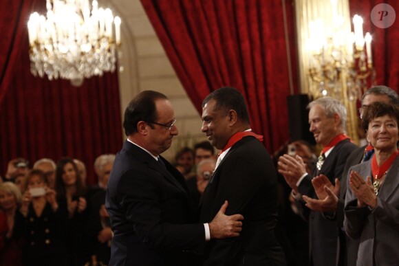 French President Francois Hollande and CEO Air Asia Group Tony Fernandes during an awarding ceremony at the Elysee Palace in Paris, France on November 28, 2013. Photo by Denis Allard/Pool/ABACAPRESS.COM28/11/2013 - Paris