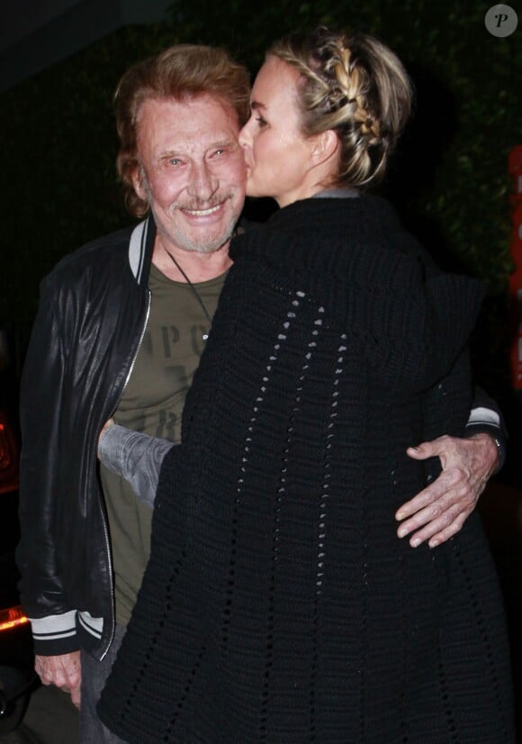 Johnny Hallyday et sa femme Laeticia Hallyday vont dîner au restaurent Giorgio Baldi à Los Angeles, le 1er décembre 2013.