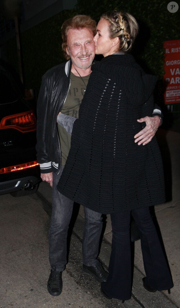Johnny Hallyday et sa femme Laeticia Hallyday vont dîner au restaurent Giorgio Baldi à Los Angeles, le 1er décembre 2013.
