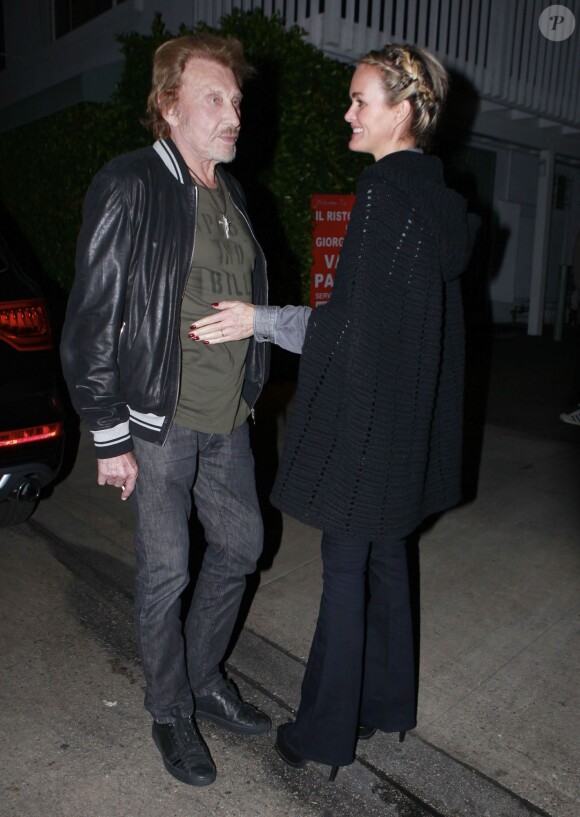 Johnny Hallyday et sa femme Laeticia Hallyday vont dîner au restaurent Giorgio Baldi à Los Angeles, le 1er décembre 2013.