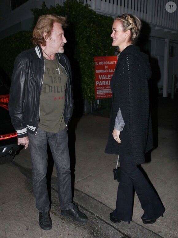 Johnny Hallyday et sa femme Laeticia Hallyday vont dîner au restaurent Giorgio Baldi à Los Angeles, le 1er décembre 2013.