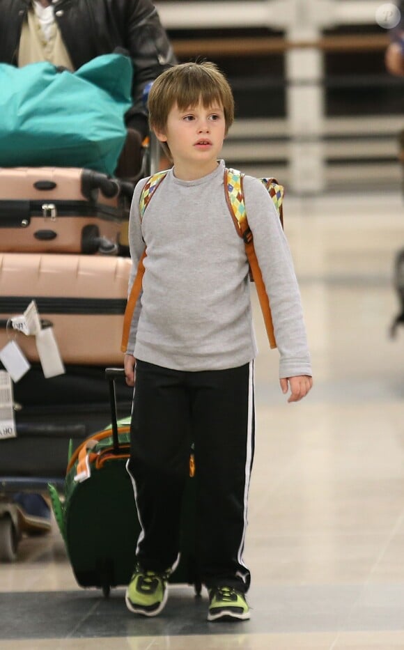 Exclusif - Quinn - Sharon Stone et ses trois enfants Roan, Quinn, et Laird arrivent à l'aéroport d'Orly en provenance de Marrakech, le 30 novembre 2013.