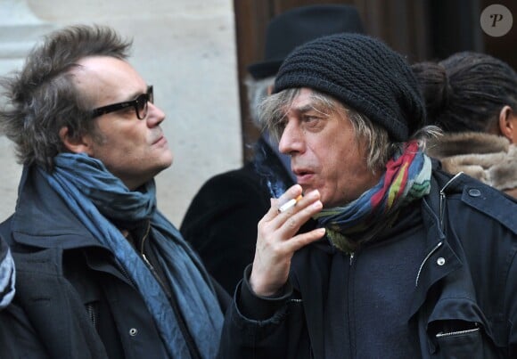 Axel Bauer et Jean Louis Aubert aux obsèques de Daniel Darc à Paris le 14 mars 2013