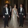La princesse Victoria de Suède arrive en compagnie des princes Carl Philip et Daniel pour le dîner offert au palais royal à Stockholm en l'honneur des lauréats des prix Nobel, le 11 décembre 2013