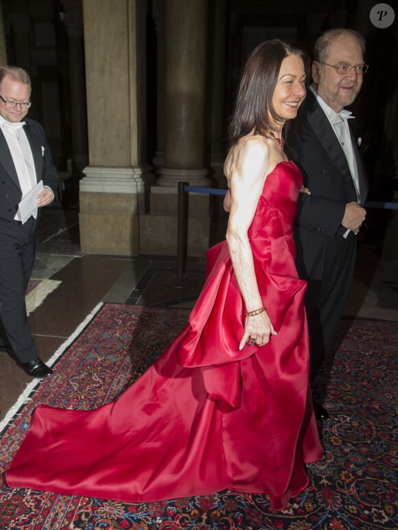 Le Prix Nobel James Rothman et sa femme Joy Hirsch arrivent pour le dîner offert au palais royal en l'honneur des lauréats des prix Nobel, le 11 décembre 2013 à Stockholm