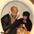 Edouard Montoute et sa femme Luvna lors de la soirée d'ouverture de la boutique UGG à Paris, le 12 décembre 2013.
