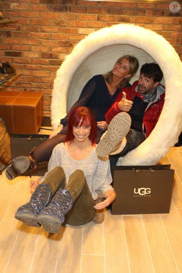 Audrey Beylemans, Stéphane Plaza et Emma lors de la soirée d'ouverture de la boutique UGG à Paris, le 12 décembre 2013.