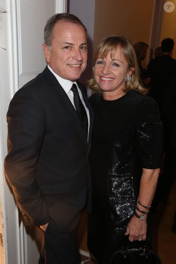 Exclusif - Michael Burke et sa femme Bridget à la 18eme édition de la vente aux enchères des Sapins de Noël des créateurs a l'hôtel Salomon de Rothschild à Paris, le 9 décembre 2013.