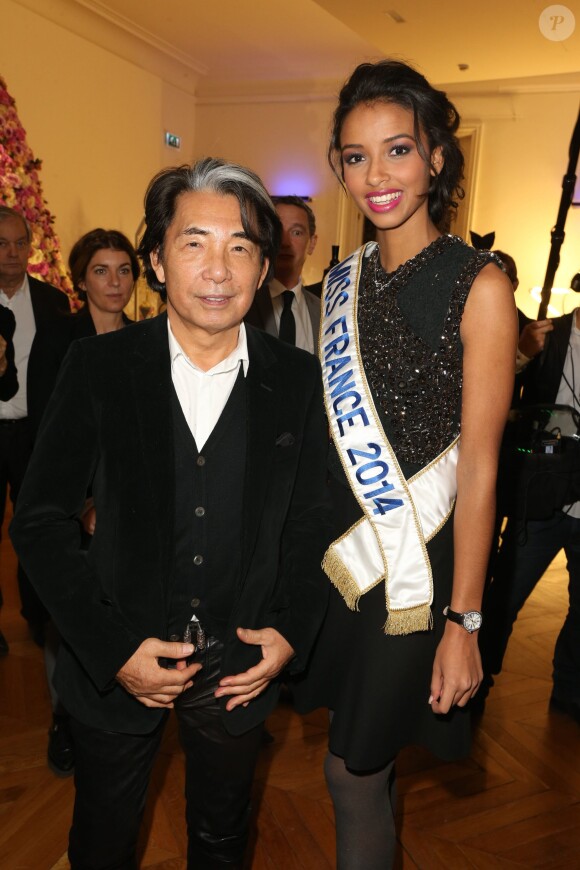 Exclusif - Kenzo Takada et Miss France 2014, Flora Coquerel à la 18eme édition de la vente aux enchères des Sapins de Noël des créateurs a l'hôtel Salomon de Rothschild à Paris, le 9 décembre 2013.